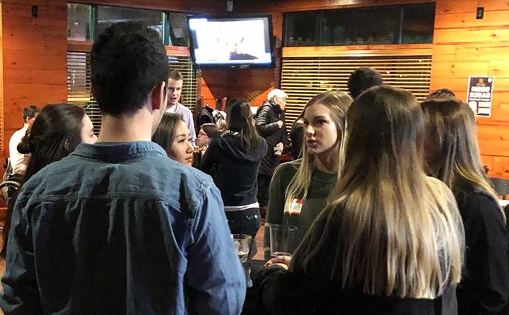 Photo of students networking at a Graduate Student Association event